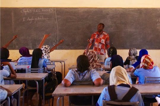 Success ahb students raising hands